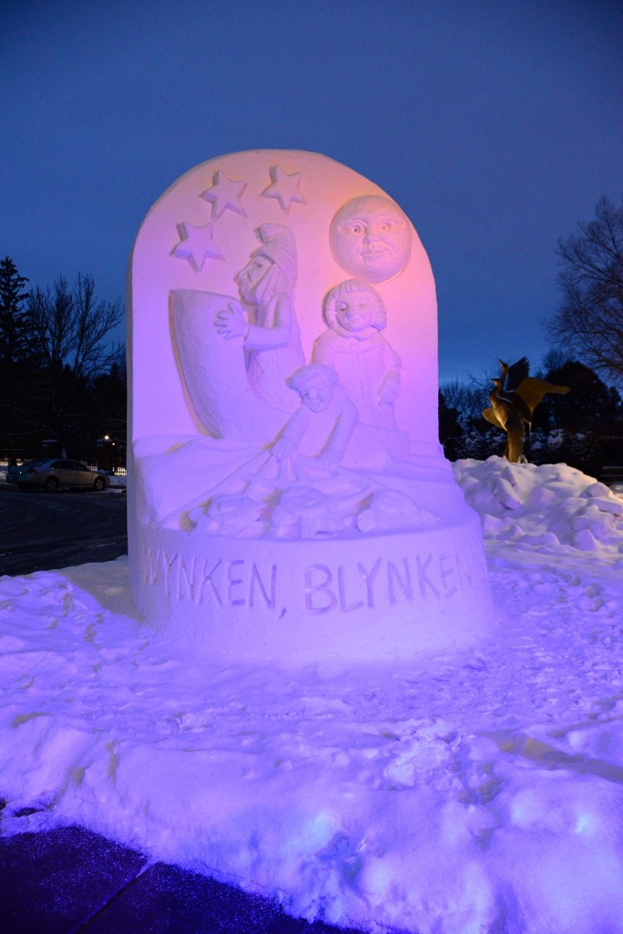 Night view of commissioned Snow Sculpture for Woodson Art Museum in Wausau, Wisconsin.